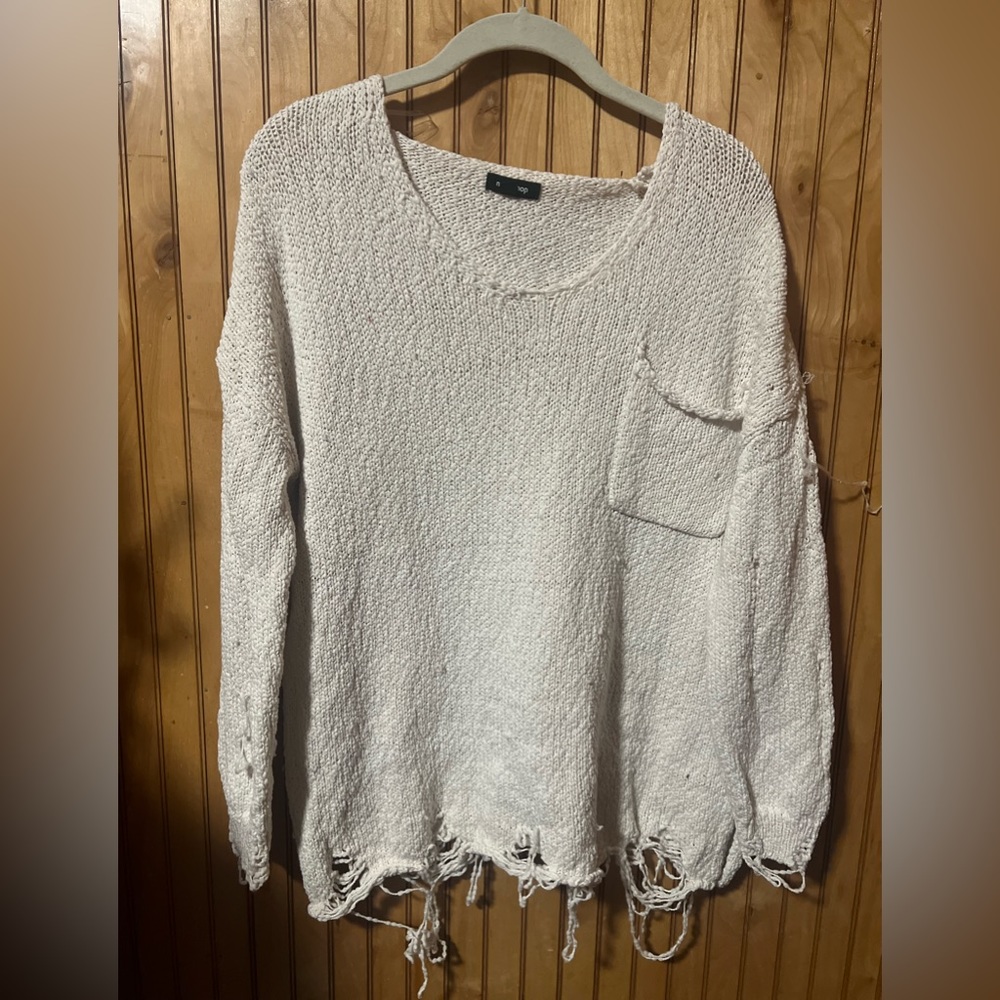 Distressed sweater